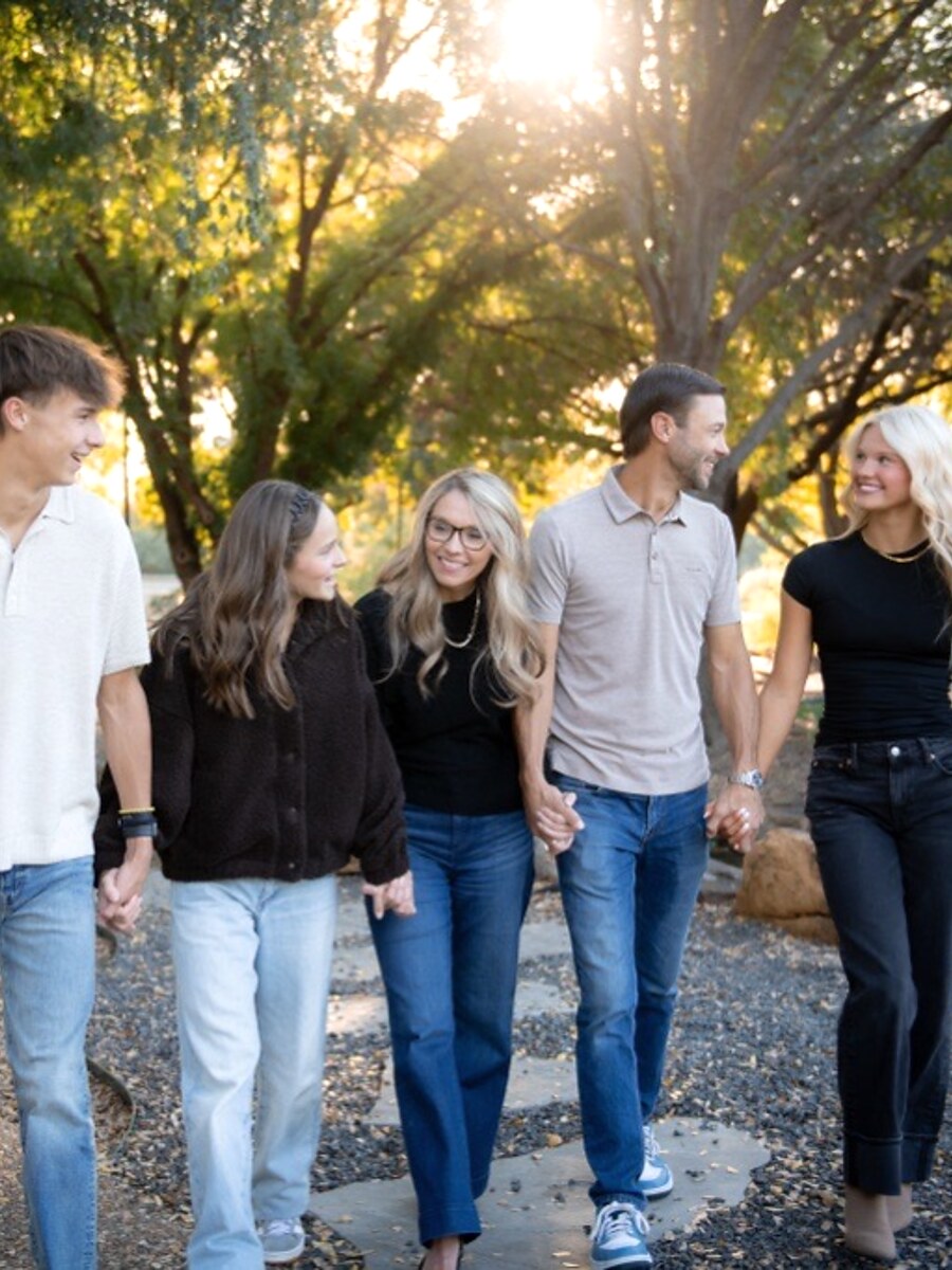 Katy walking with her family