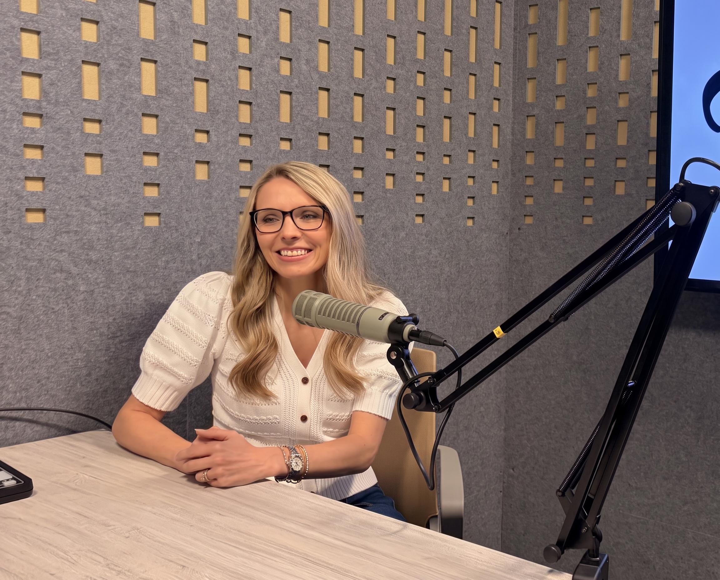 Katy Encalade recording a podcast episode